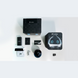 Enabot EBO X what's in the box: robot, charging dock, adapter, cable, manual, microSD card
