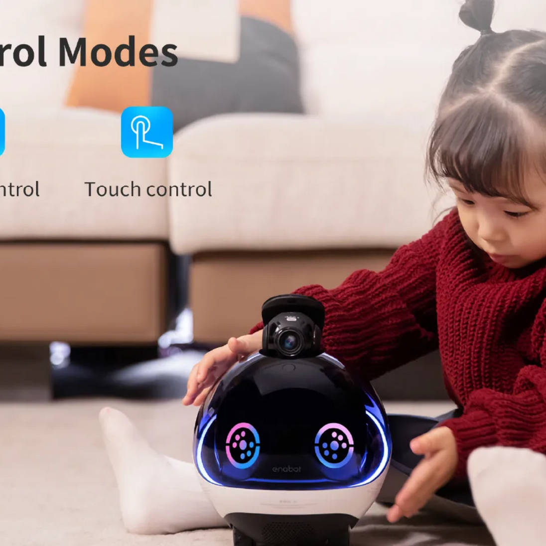 Child interacting with the Enabot EBO X robot at home