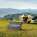 BLUETTI SP100L solar panel charging a power station outdoors