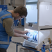 Operator loading spools into the UltiMaker Material Station